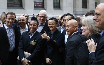 The Simpson Thacher team celebrates with Alibaba outside the NYSE